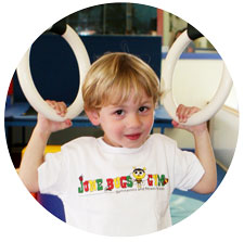 child playing on rings