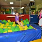 jumping into the foam pit fun